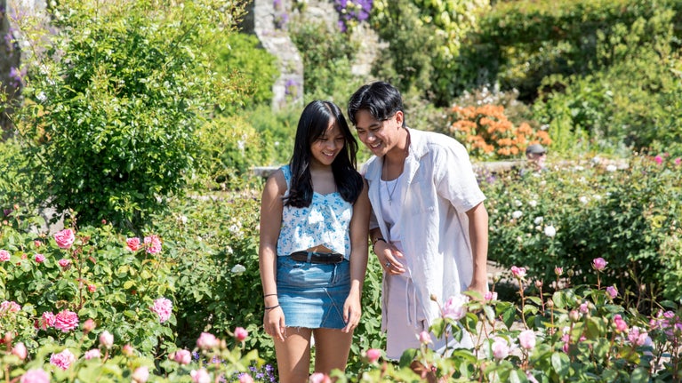 Visitors exploring the Formal garden at Bodnant Garden, Conwy, Wales